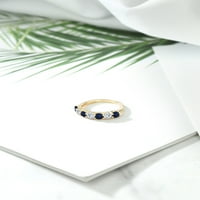Gem Stone King 18K žuti pozlaćeni srebrni okrugli safirni i moissnatni godišnjički prsten za žene