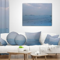 Art DesimanArt 'Light Blue zalazak sunca na luksuz KWU Tan Beach' Pejzažni jastuk od tiskanog bacanja